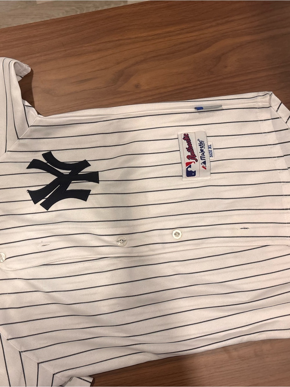 Majestic White Jersey with Navy Pinstripes